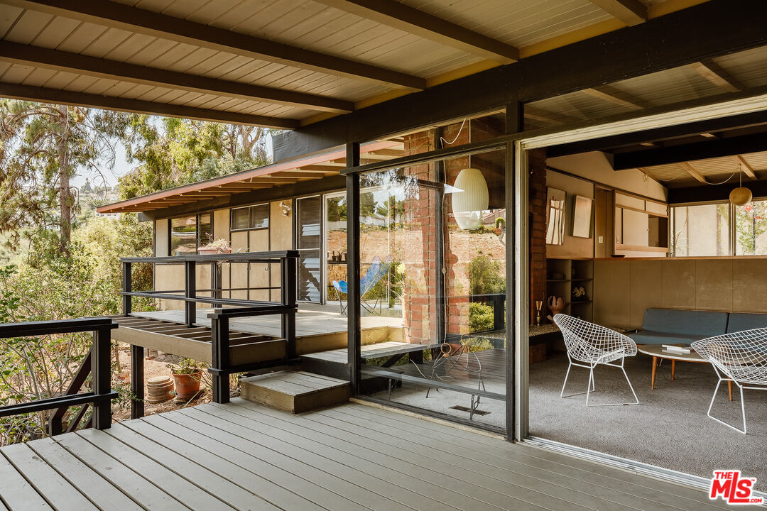 2 Seahurst Road Rolling Hills Estates, CA 90274 - Photo 11 of 54 a view of a porch with furniture and a window