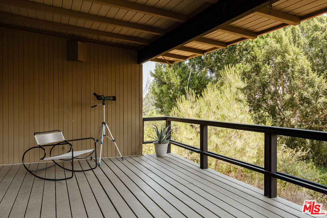 2 Seahurst Road Rolling Hills Estates, CA 90274 - Photo 13 of 54 a balcony with wooden floor and outdoor seating