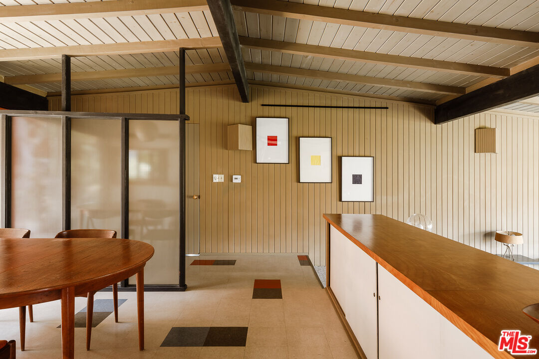 2 Seahurst Road Rolling Hills Estates, CA 90274 - Photo 17 of 54 a view of a hallway with a dining table and chairs