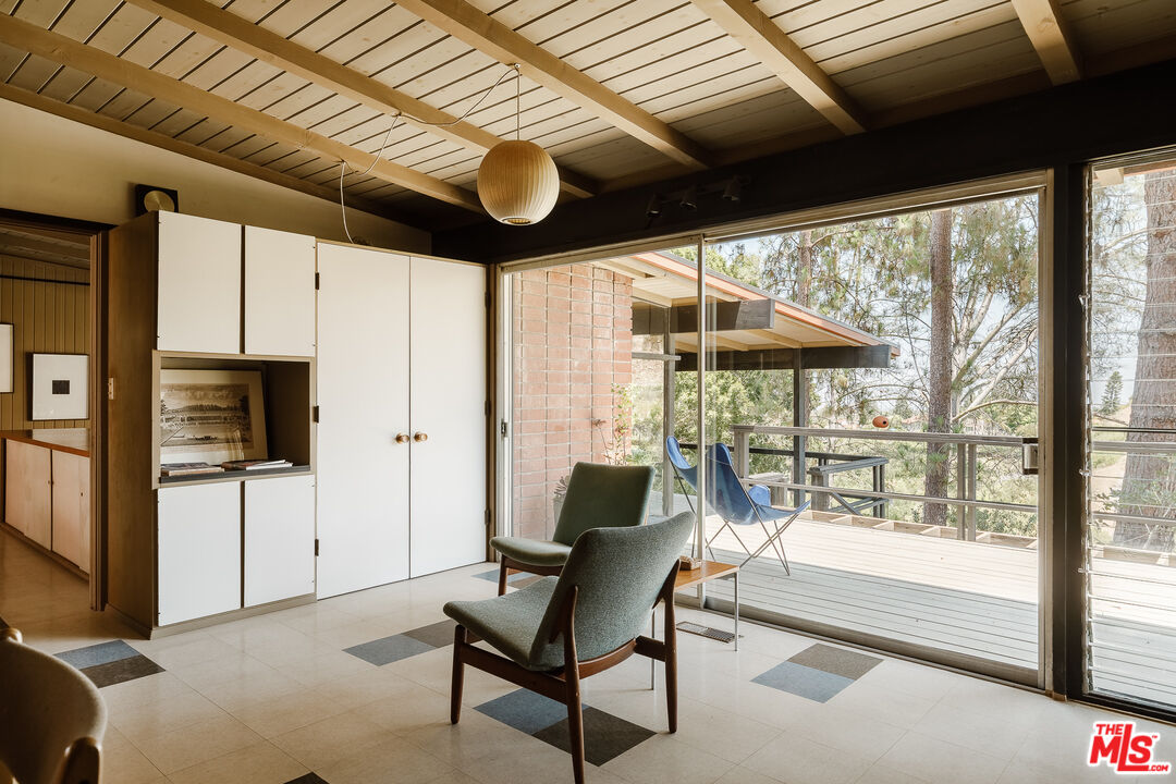 2 Seahurst Road Rolling Hills Estates, CA 90274 - Photo 22 of 54 a living room with furniture and a flat screen tv