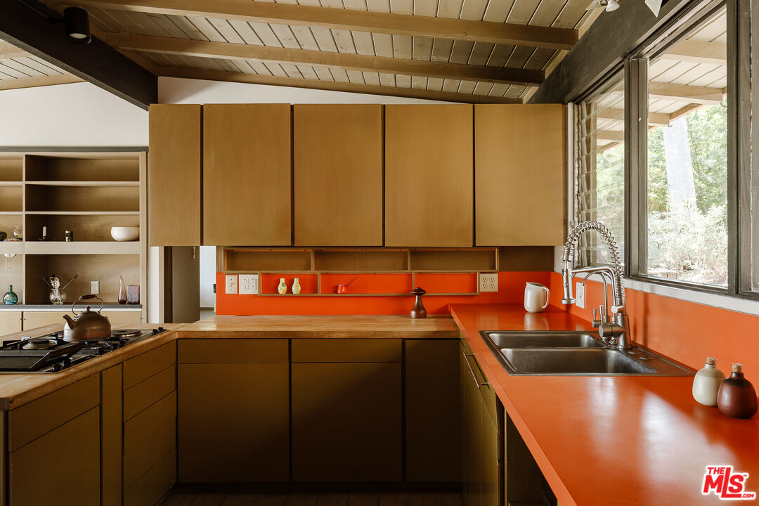 2 Seahurst Road Rolling Hills Estates, CA 90274 - Photo 26 of 54 a kitchen with a sink a counter top space and cabinets