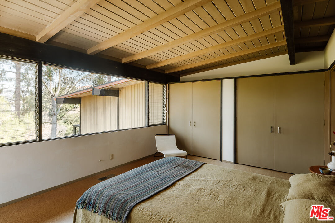 2 Seahurst Road Rolling Hills Estates, CA 90274 - Photo 37 of 54 a bedroom with a bed and a large window