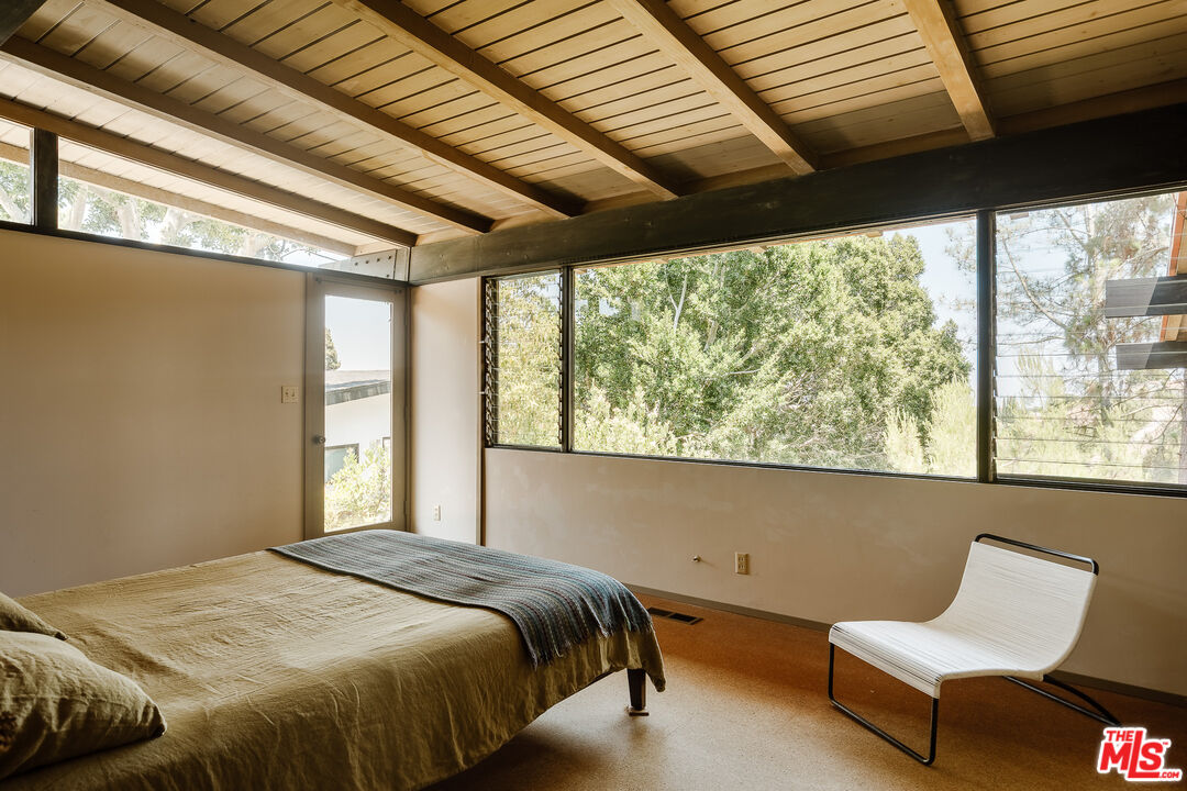 2 Seahurst Road Rolling Hills Estates, CA 90274 - Photo 38 of 54 a bed sitting in a bedroom next to a window