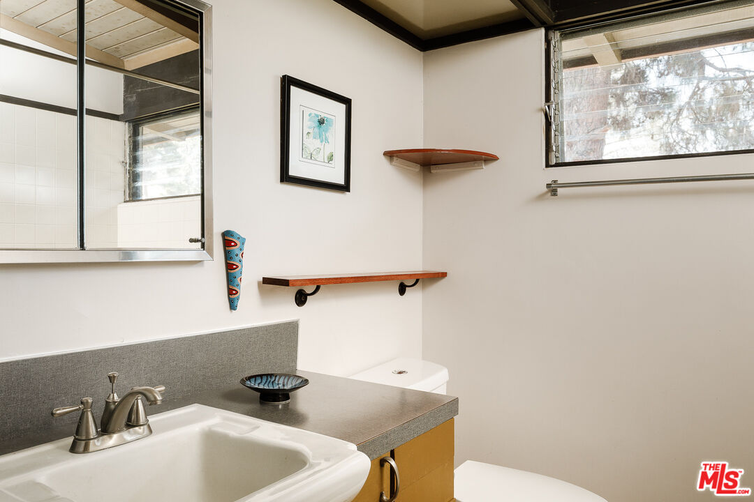 2 Seahurst Road Rolling Hills Estates, CA 90274 - Photo 41 of 54 a bathroom with a sink and a toilet
