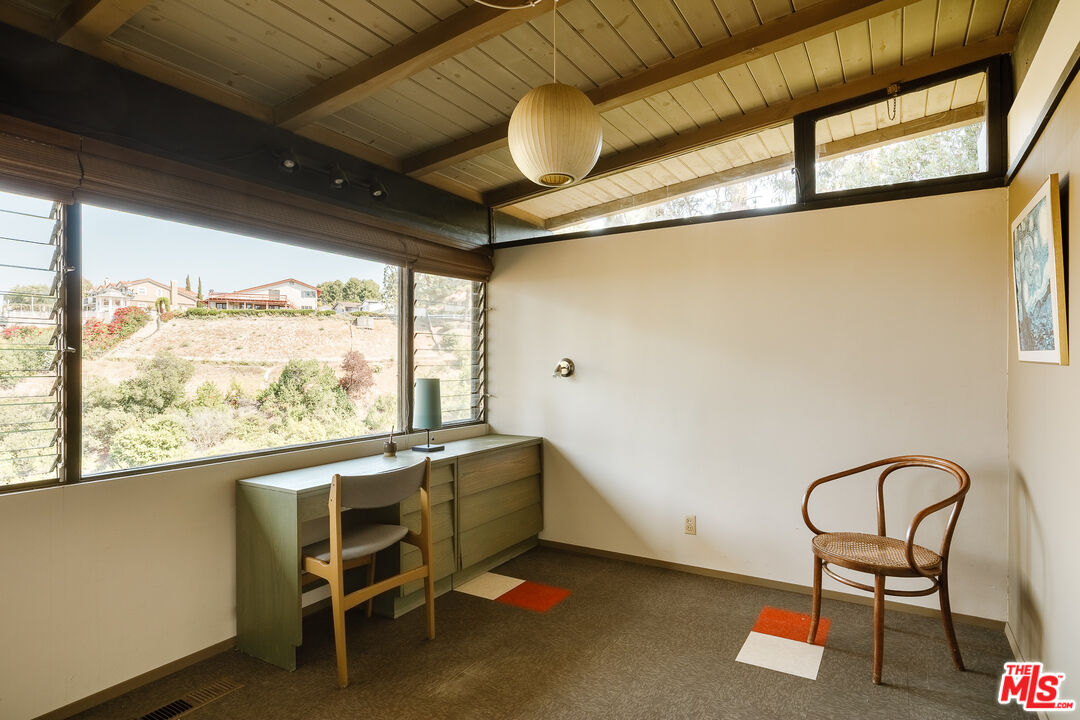 2 Seahurst Road Rolling Hills Estates, CA 90274 - Photo 42 of 54 a dining room with furniture and a window