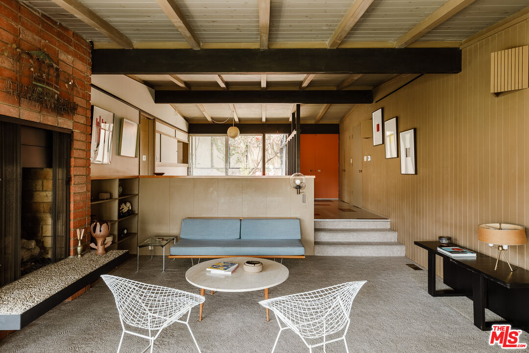 2 Seahurst Road Rolling Hills Estates, CA 90274 - Photo 10 of 54 a living room with furniture and a table