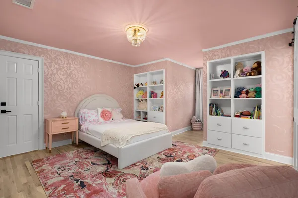 a bedroom with a bed and closet