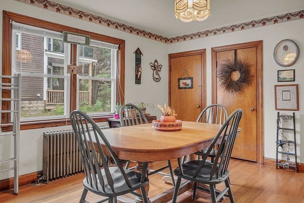 138 Cottage Street Athol, MA 01331 - Photo 12 of 42 a view of a dining room with furniture window and wooden floor