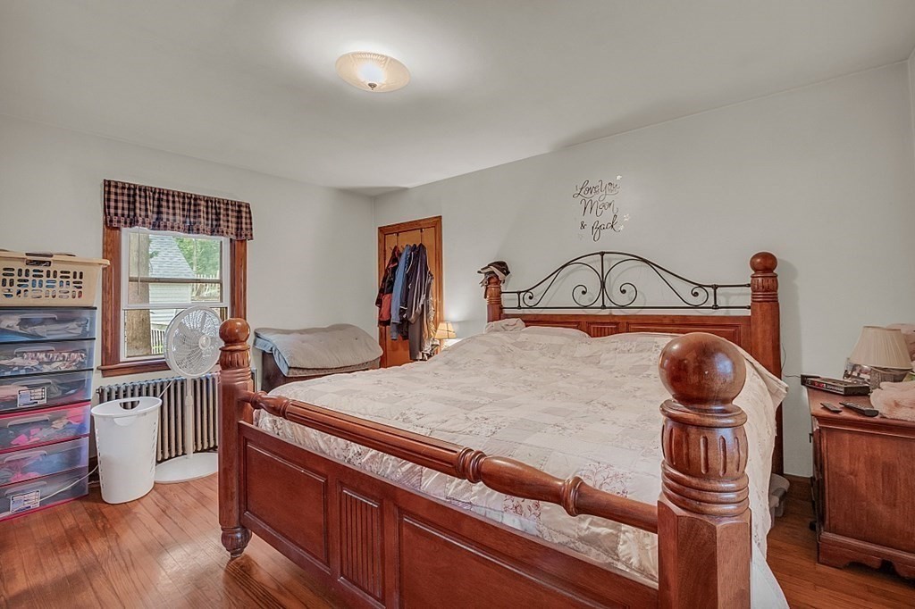 138 Cottage Street Athol, MA 01331 - Photo 14 of 42 a bed sitting in a room next to a window