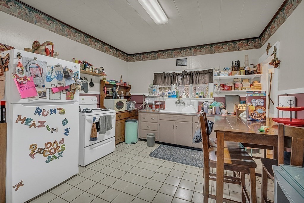 138 Cottage Street Athol, MA 01331 - Photo 17 of 42 a storage room with washer and dryer