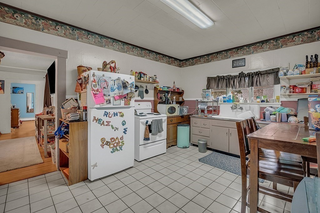 138 Cottage Street Athol, MA 01331 - Photo 18 of 42 a room with storage and utility