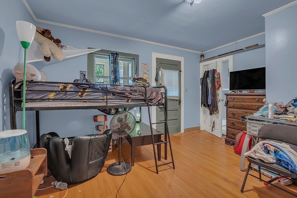 138 Cottage Street Athol, MA 01331 - Photo 27 of 42 a view of a livingroom with furniture and a flat screen tv