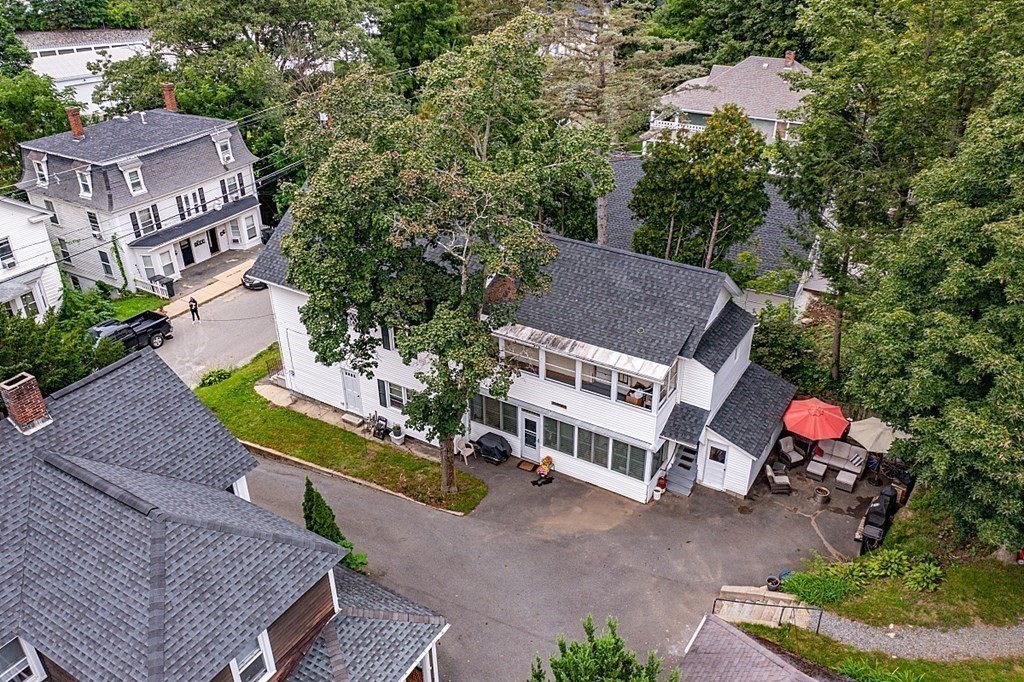 138 Cottage Street Athol, MA 01331 - Photo 31 of 42 an aerial view of a house with a garden and mountain view in back