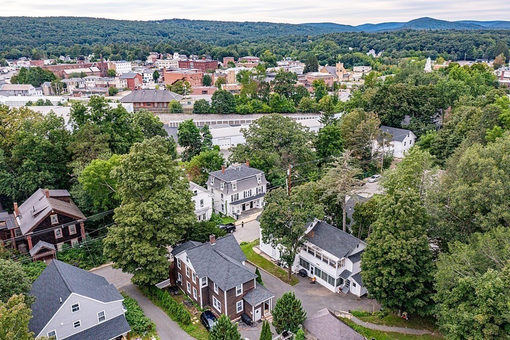 138 Cottage Street Athol, MA 01331 - Photo 40 of 42 an aerial view of residential houses with outdoor space