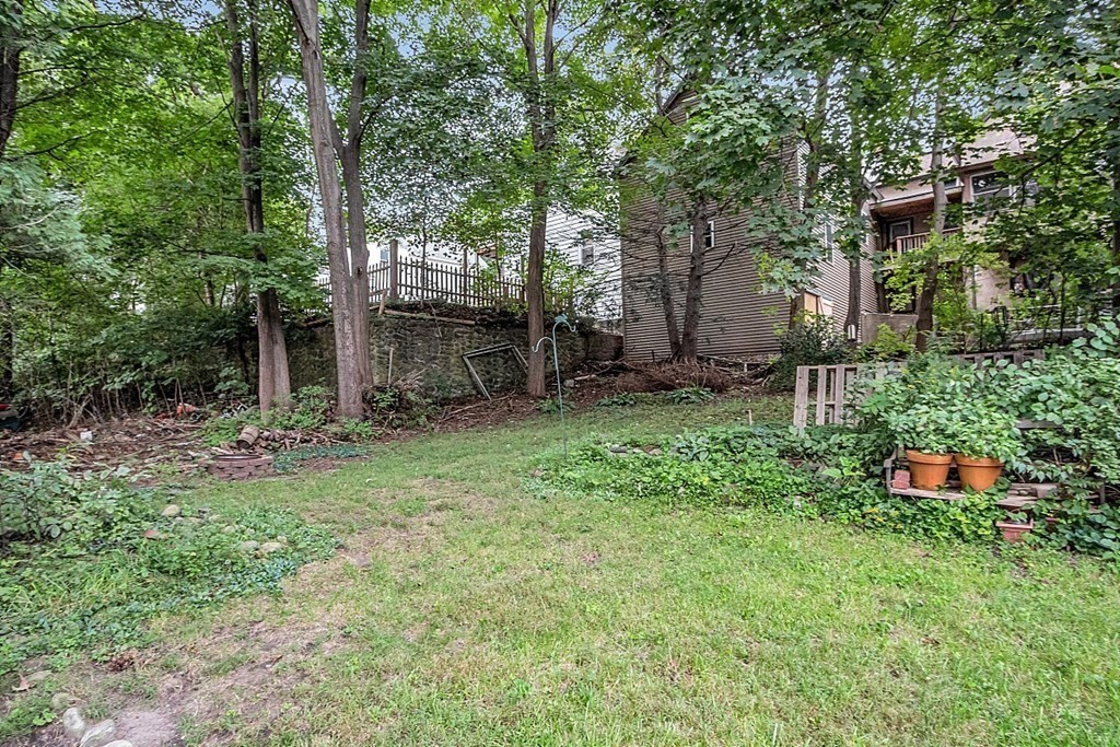 138 Cottage Street Athol, MA 01331 - Photo 41 of 42 a backyard of a house with seating space