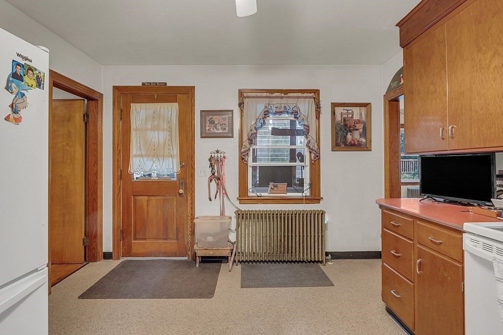 138 Cottage Street Athol, MA 01331 - Photo 6 of 42 a bedroom with a bed and a flat screen tv