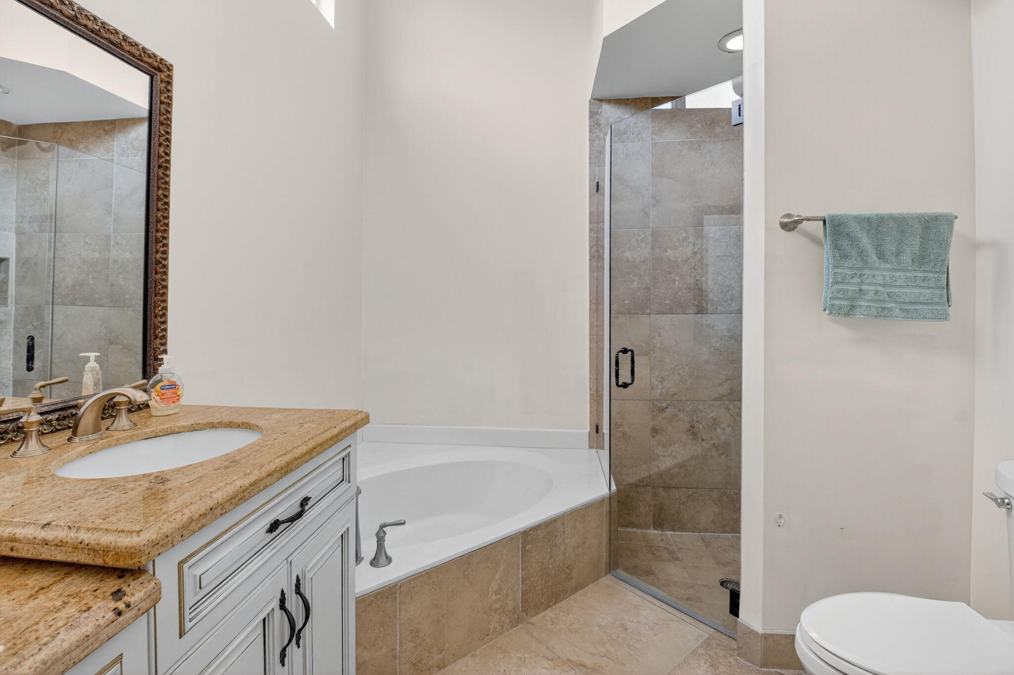 4101 Northwest 2nd Lane Delray Beach, FL 33445 - Photo 20 of 47 a bathroom with a granite countertop sink toilet and shower