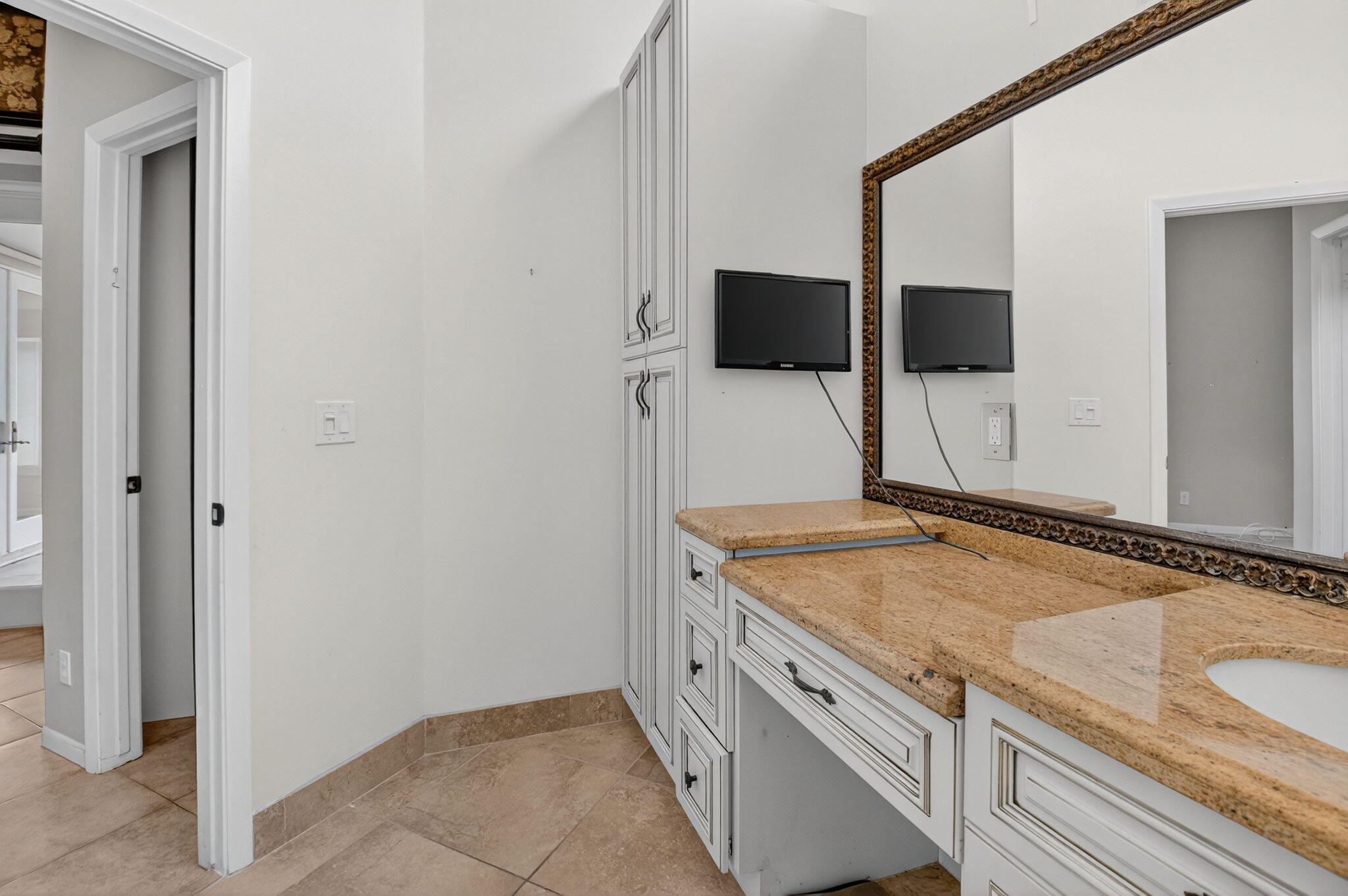 4101 Northwest 2nd Lane Delray Beach, FL 33445 - Photo 23 of 47 a spacious bathroom with a granite countertop sink and a mirror