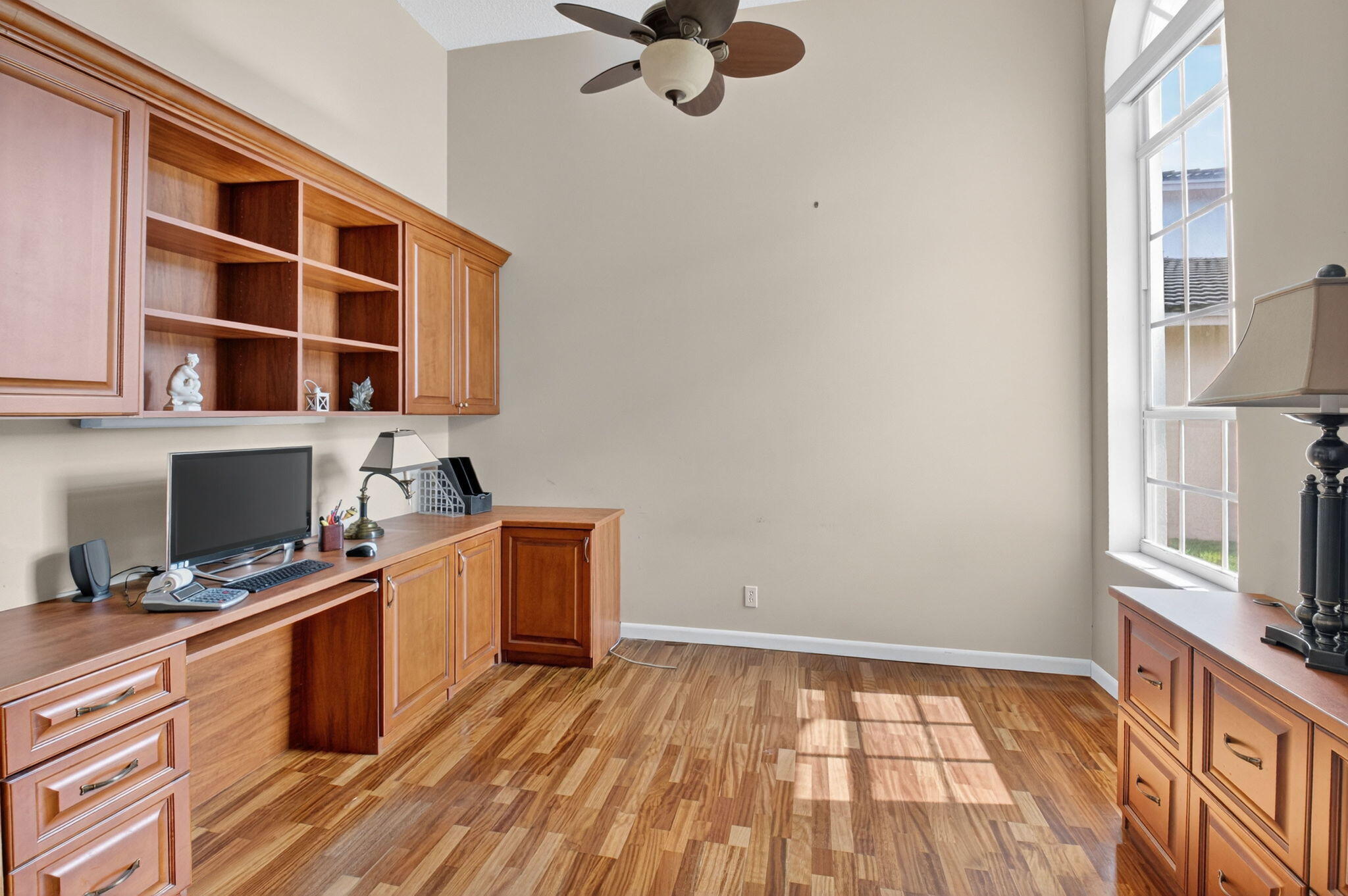 4101 Northwest 2nd Lane Delray Beach, FL 33445 - Photo 25 of 47 a view of a workspace with furniture and a window