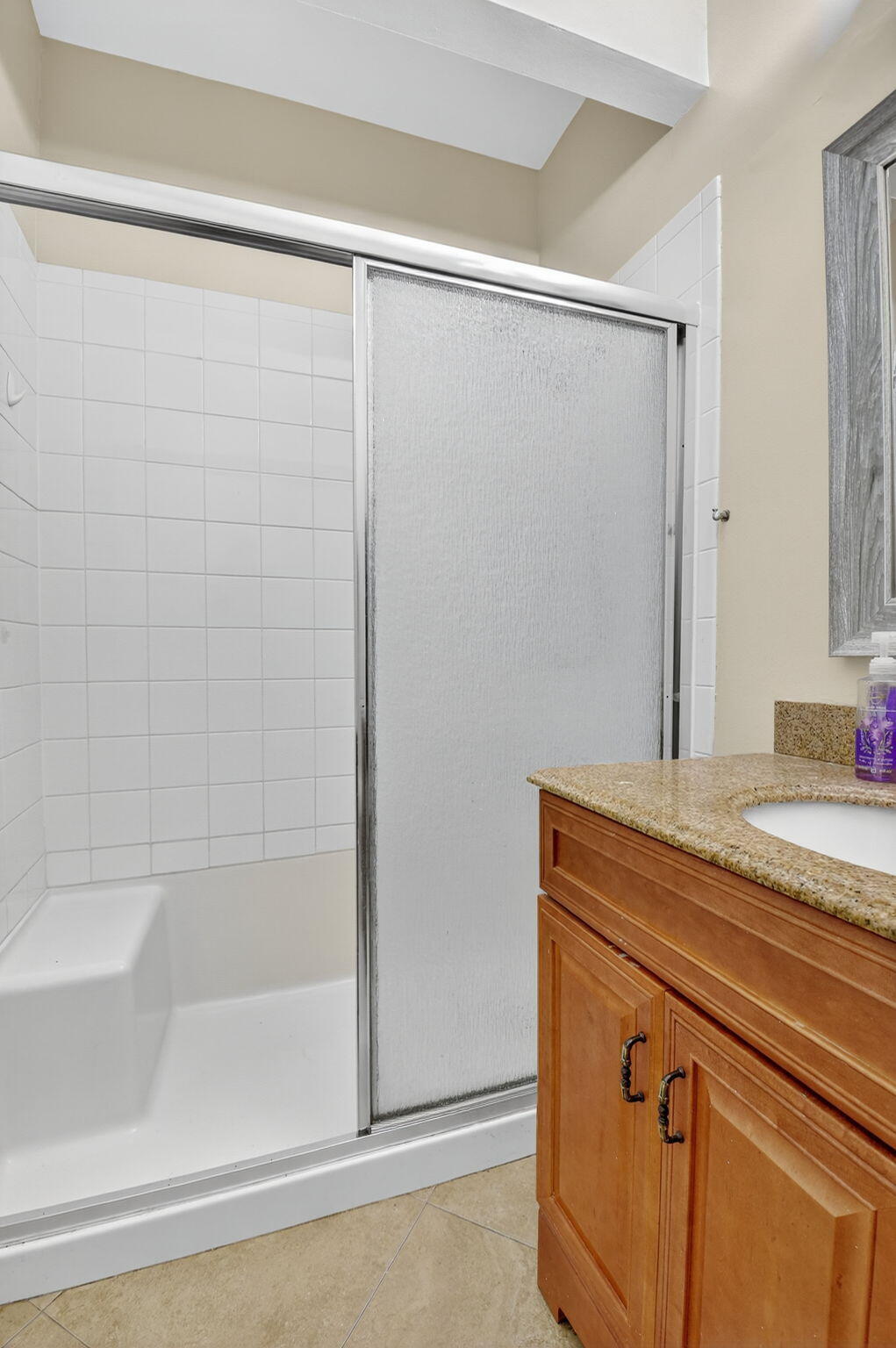 4101 Northwest 2nd Lane Delray Beach, FL 33445 - Photo 27 of 47 a bathroom with a shower and a sink