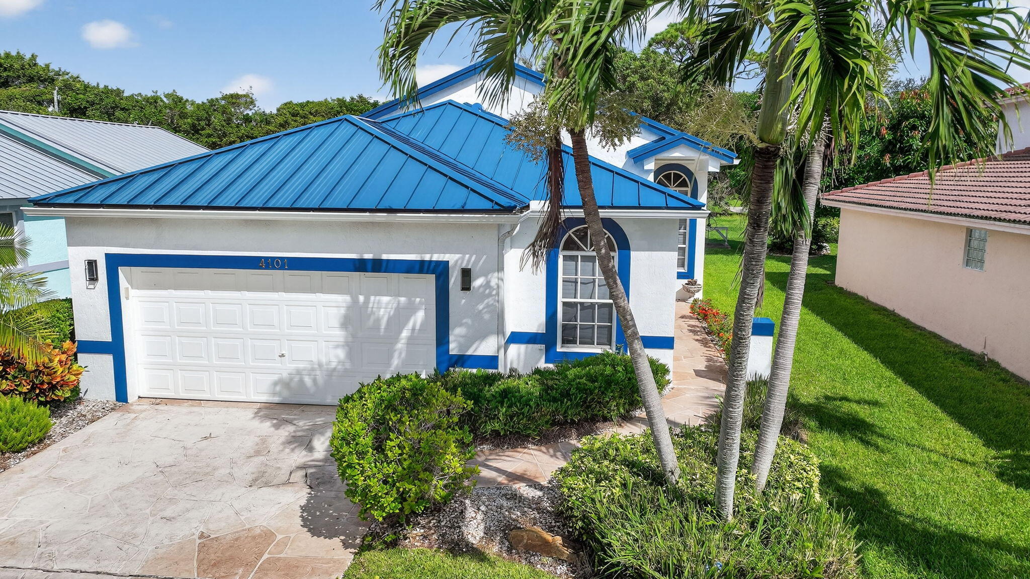 4101 Northwest 2nd Lane Delray Beach, FL 33445 - Photo 37 of 47 a front view of a house with garden