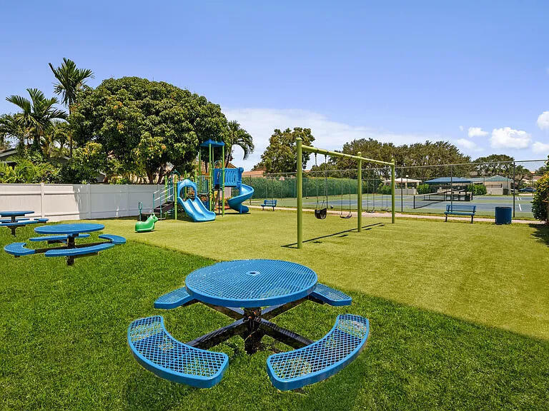 4101 Northwest 2nd Lane Delray Beach, FL 33445 - Photo 42 of 47 a view of a backyard with swimming pool and green space
