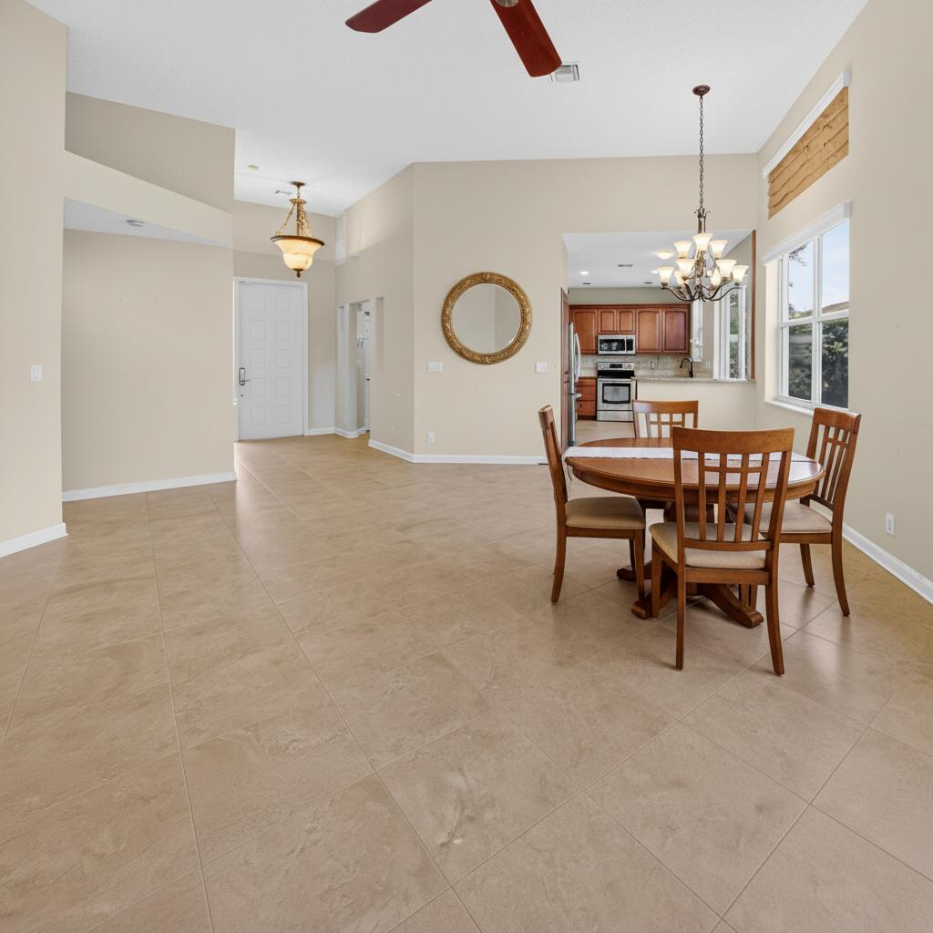4101 Northwest 2nd Lane Delray Beach, FL 33445 - Photo 9 of 47 a view of a dining room with furniture