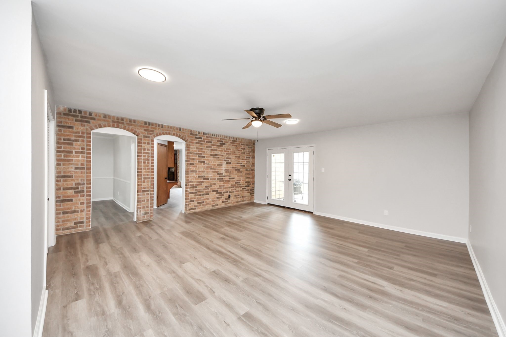3923 Cypress Lake Drive Spring, TX 77388 - Photo 20 of 41 Endless possibilities await in this spacious room, highlighted by double archways to the dining and kitchen areas.