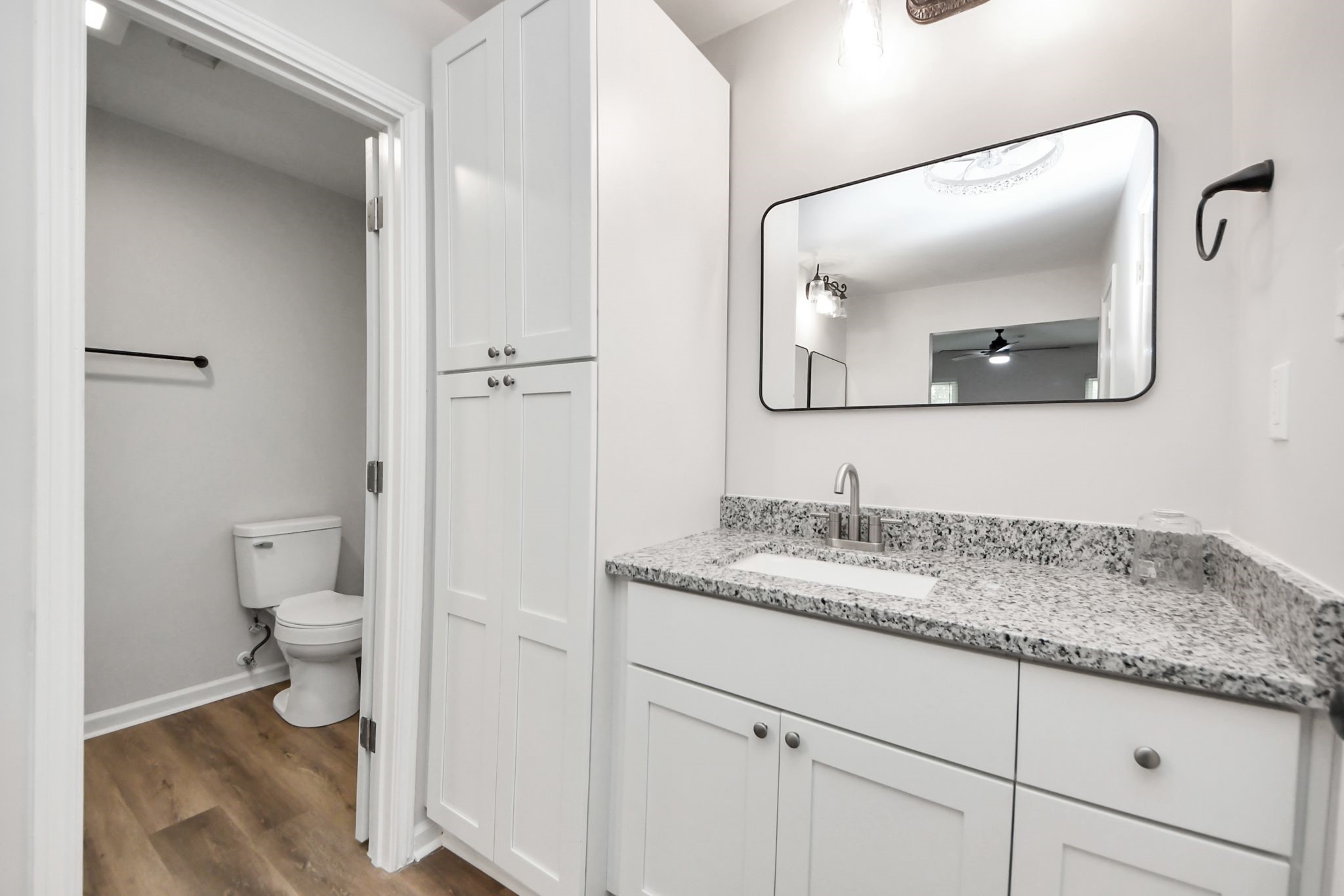 3923 Cypress Lake Drive Spring, TX 77388 - Photo 27 of 48 a bathroom with a granite countertop sink toilet and mirror