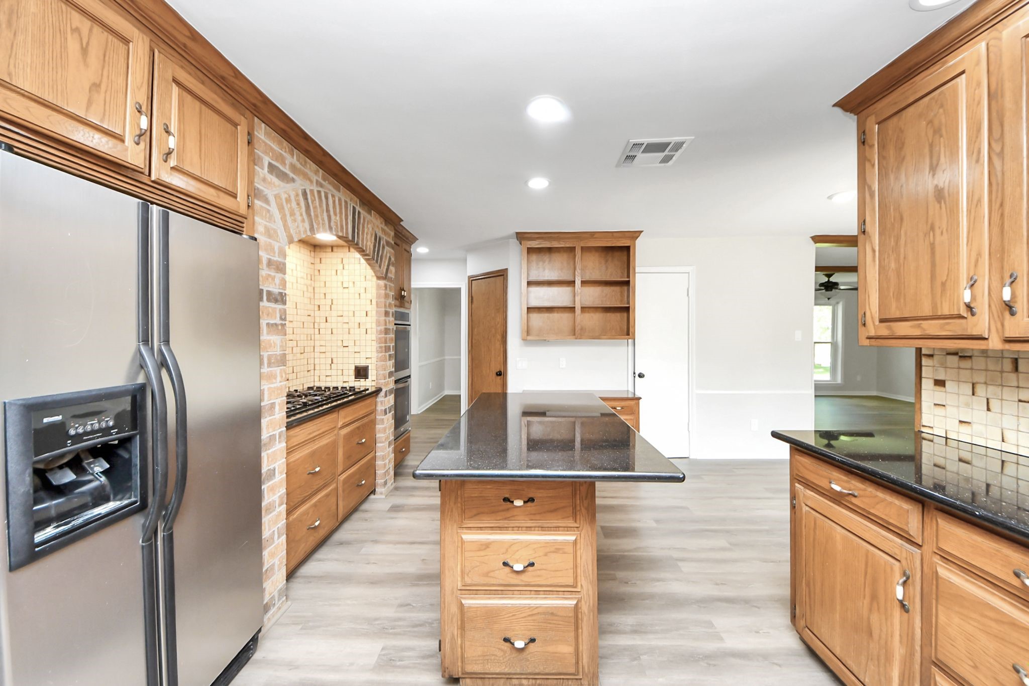 3923 Cypress Lake Drive Spring, TX 77388 - Photo 7 of 48 a kitchen with stainless steel appliances granite countertop a refrigerator and a stove