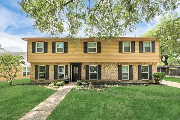 front view of house with a yard
