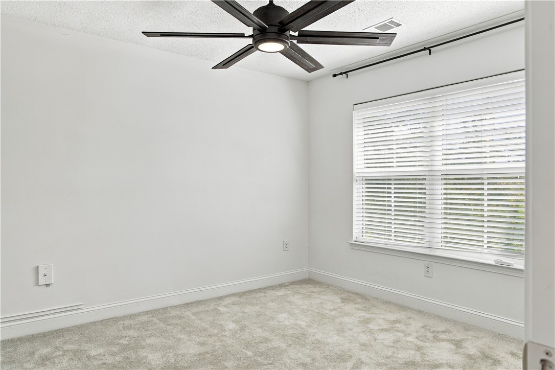 636 Lookover Drive Anderson, SC 29621 - Photo 22 of 34 Soft carpeting underfoot and a wide window create a comfortable, inviting secondary bedroom.