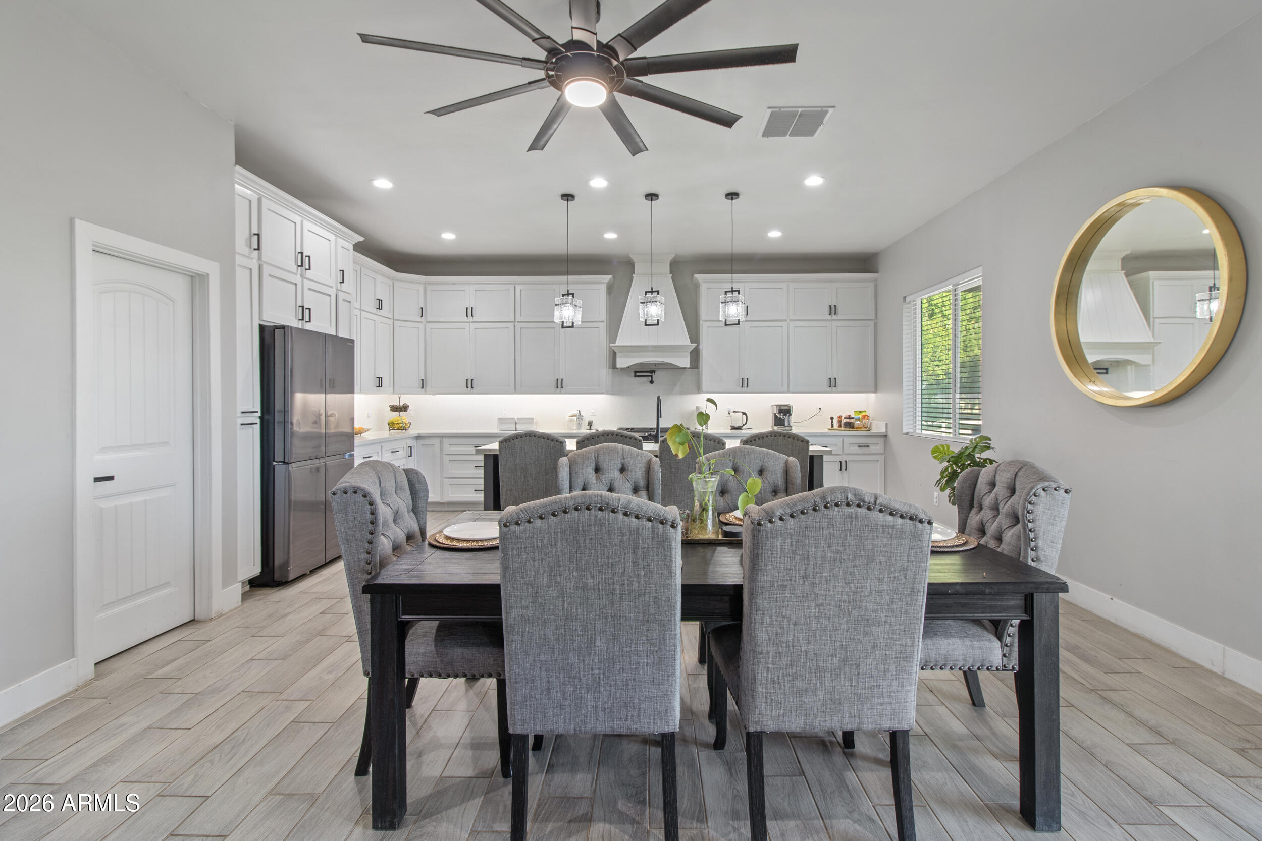 22531 West Harwell Road Buckeye, AZ 85326 - Photo 15 of 40 a dining room with furniture and window