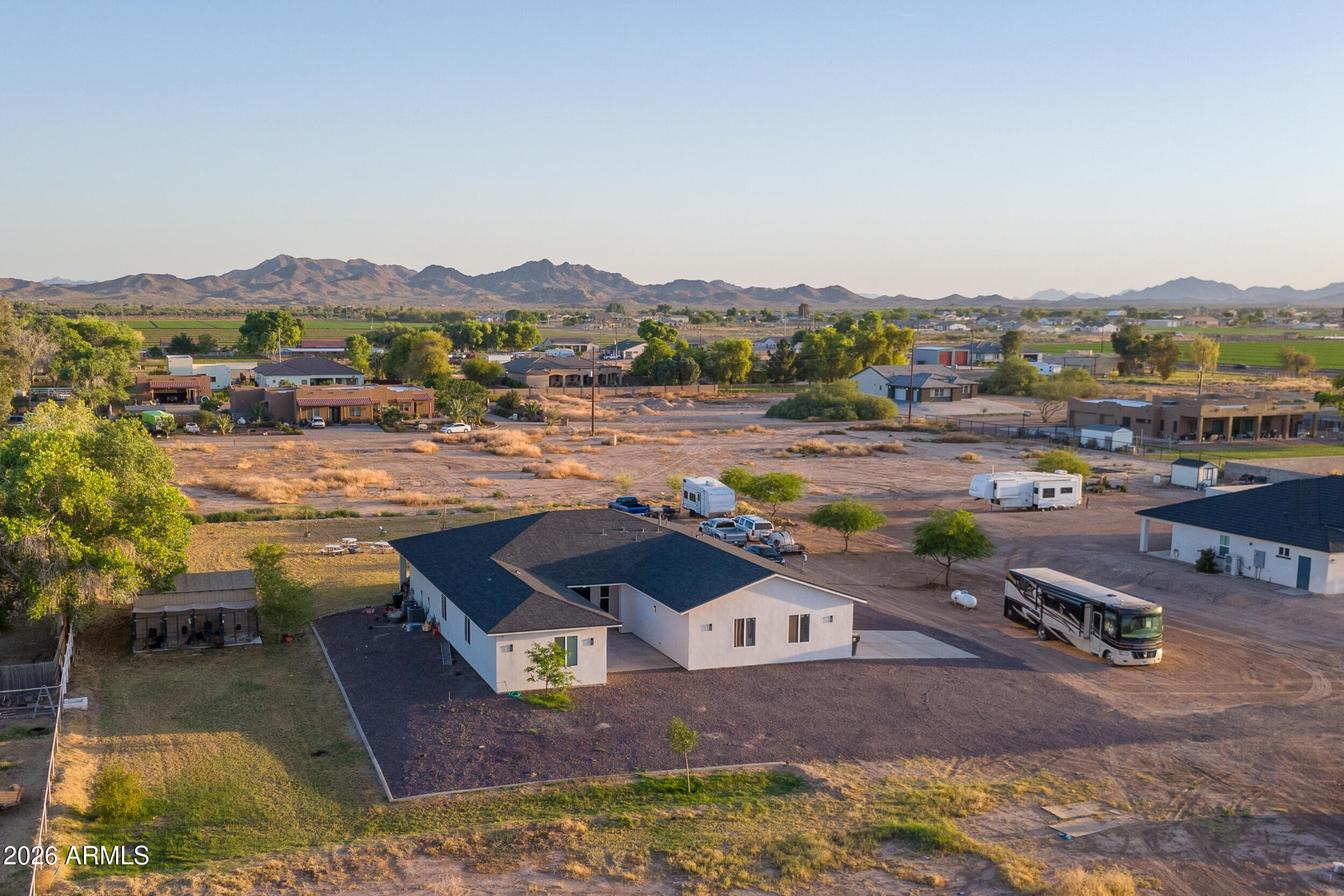 22531 West Harwell Road Buckeye, AZ 85326 - Photo 7 of 40 a view of a lake with lawn chairs