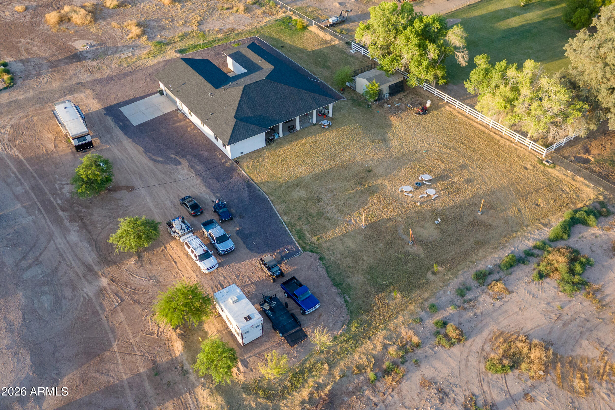 22531 West Harwell Road Buckeye, AZ 85326 - Photo 10 of 40 an aerial view of a house with a yard and lake view