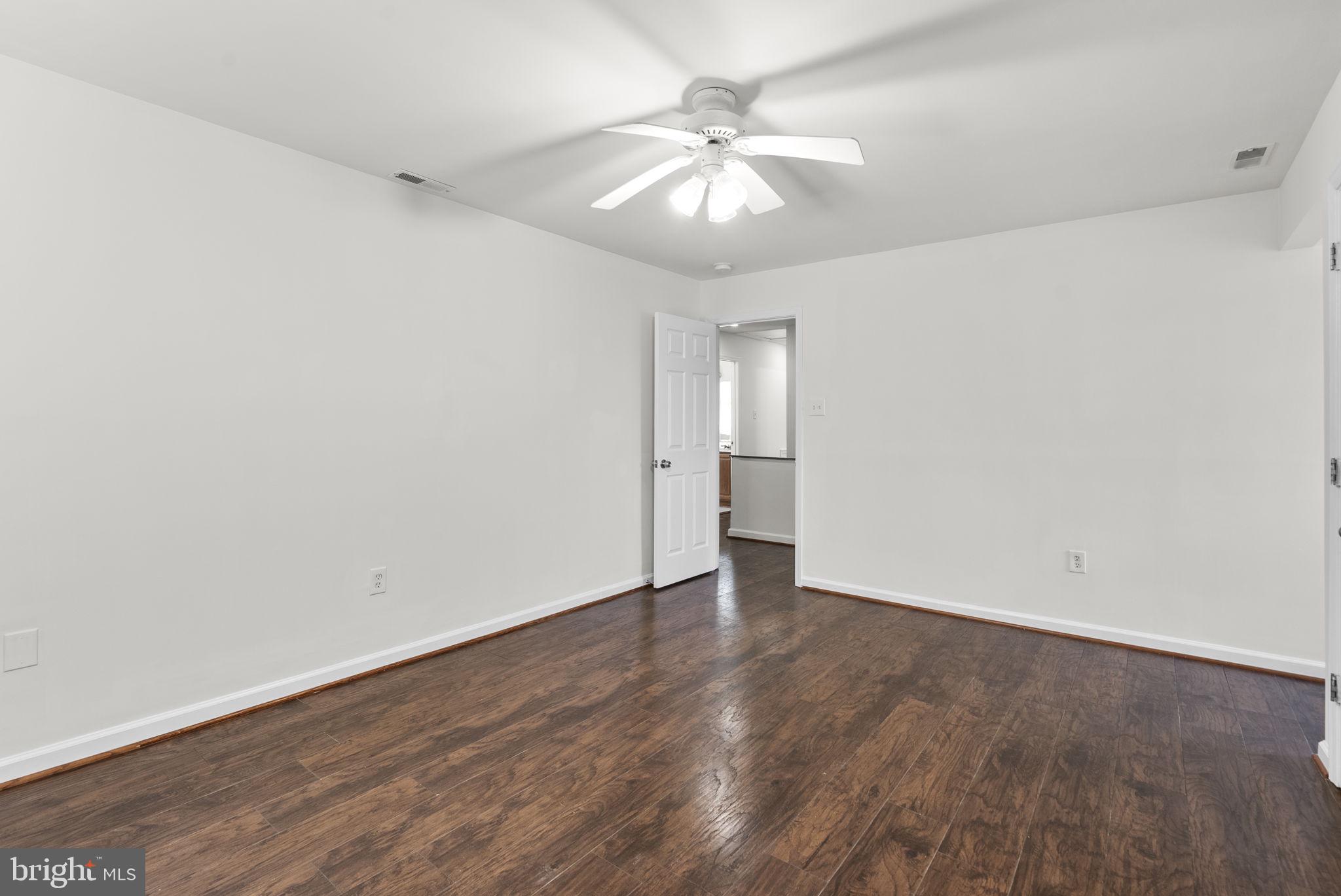 24000 Clarksburg Road Clarksburg, MD 20871 - Photo 37 of 60 wooden floor in an empty room