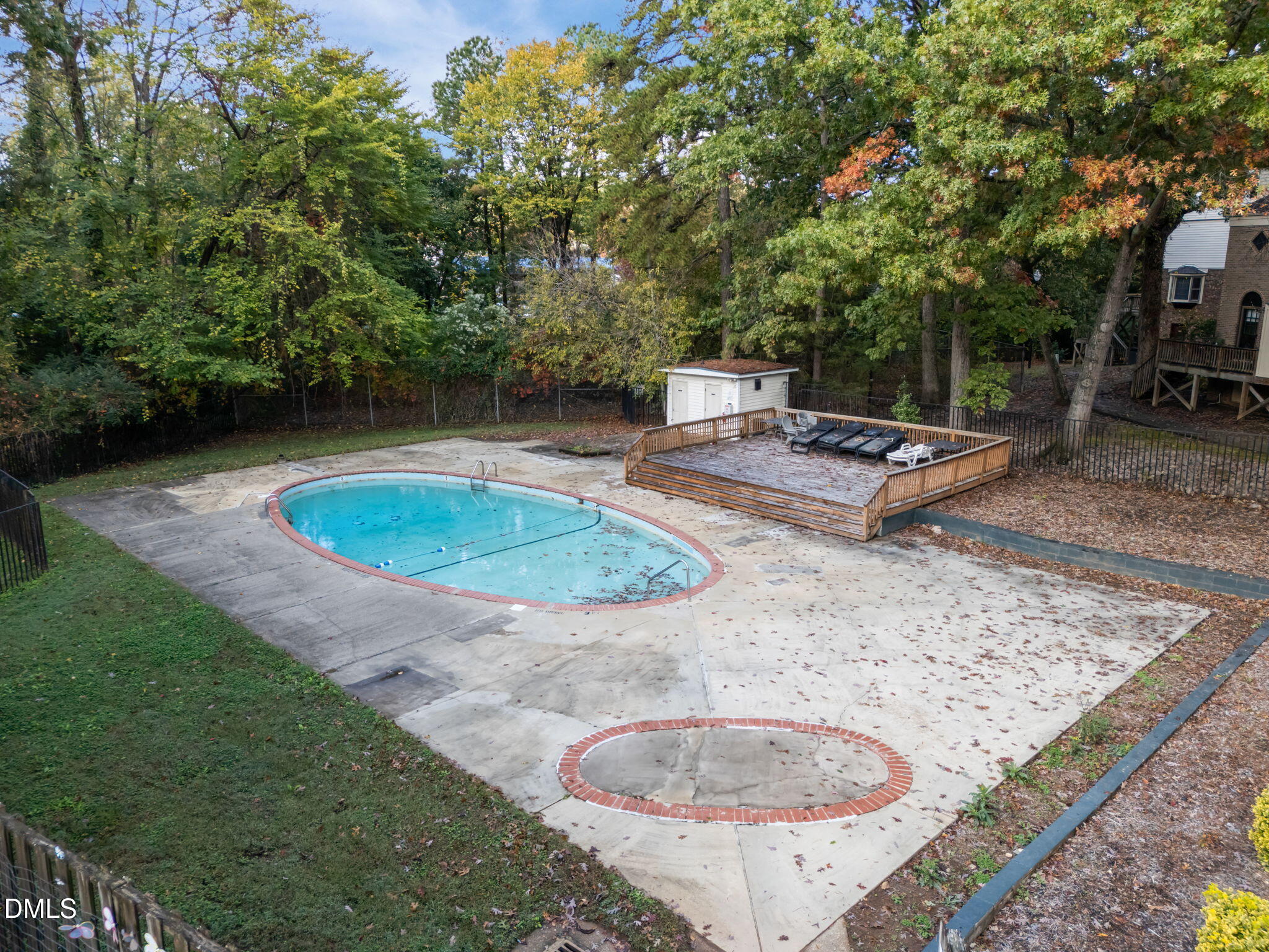 6423 New Market Way Raleigh, NC 27615 - Photo 29 of 33 a view of a swimming pool with a patio