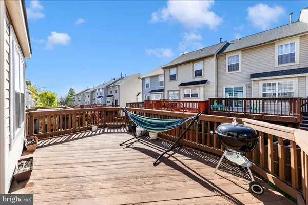 a view of a house with a large window and wooden floor