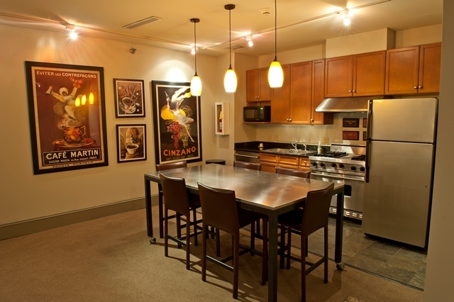 1801 Tower Drive, Unit E243 Glenview, IL 60026 - Photo 20 of 26 a kitchen with stainless steel appliances granite countertop a sink a stove and a refrigerator