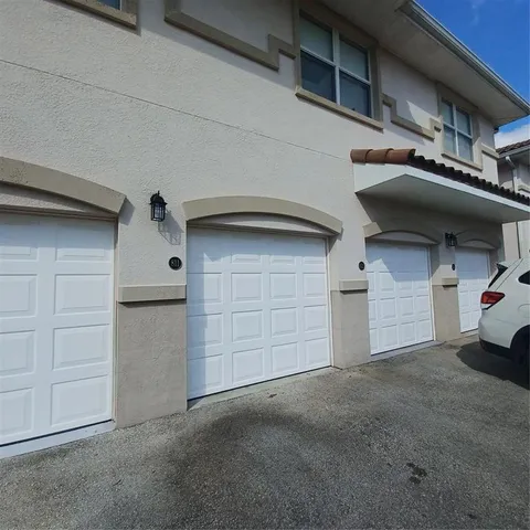 a view of a house with a swimming pool