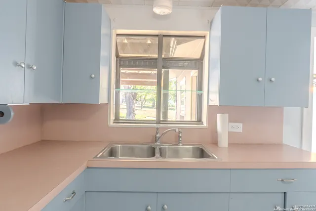 a bathroom with a sink and a bathtub