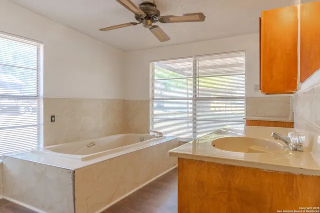 a bathroom with a sink and a bathtub