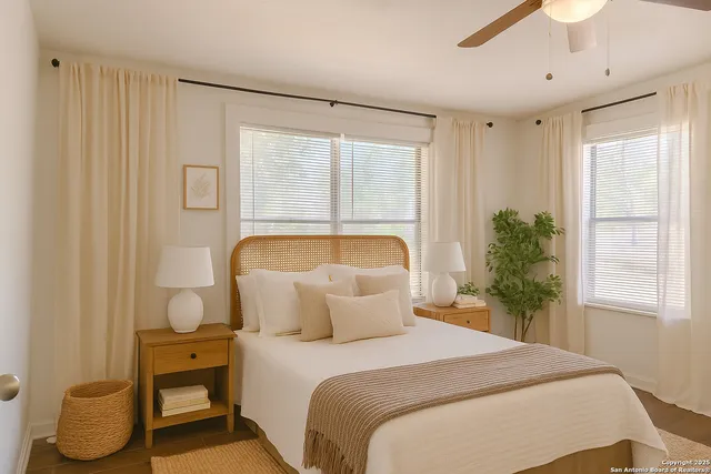 a bedroom with a bed and window