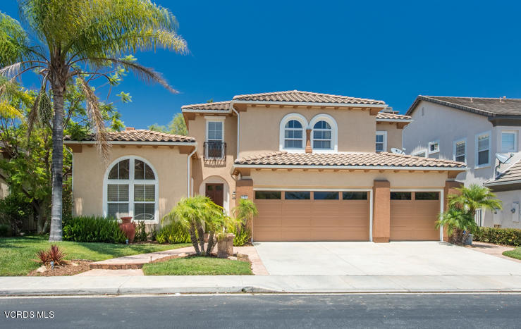 277 Knoll Ridge Road Simi Valley, CA 93065 - Photo 1 of 37 a front view of a house with a garden and plants