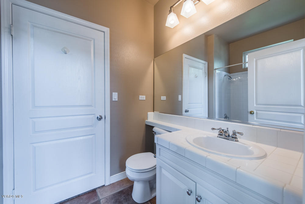 277 Knoll Ridge Road Simi Valley, CA 93065 - Photo 13 of 37 a bathroom with a sink and a mirror