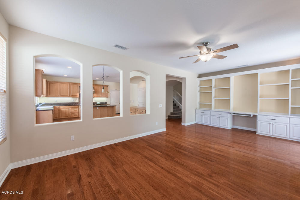 277 Knoll Ridge Road Simi Valley, CA 93065 - Photo 19 of 37 a view of an empty room with a window and wooden floor