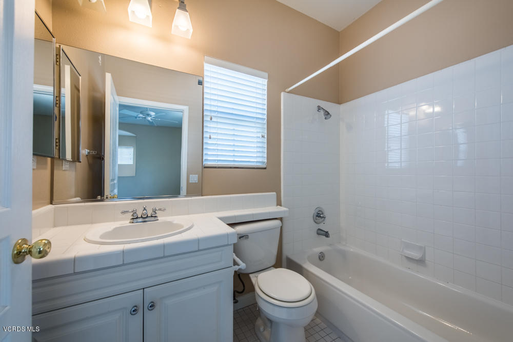 277 Knoll Ridge Road Simi Valley, CA 93065 - Photo 28 of 37 a bathroom with a sink toilet and shower
