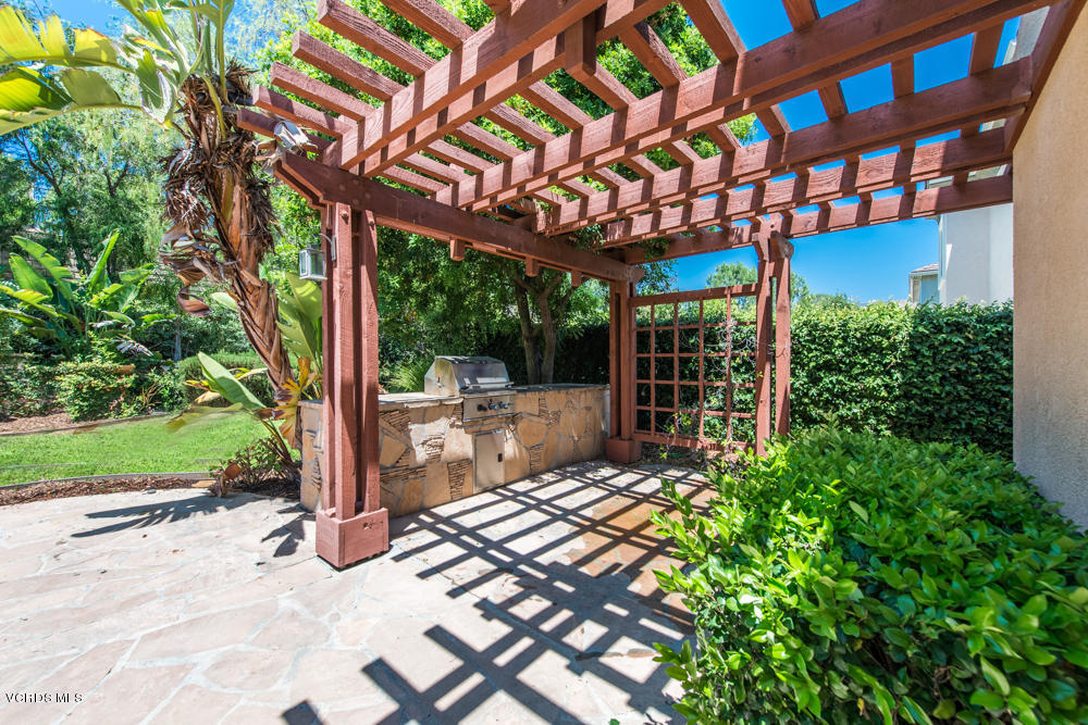 277 Knoll Ridge Road Simi Valley, CA 93065 - Photo 33 of 37 a view of a porch with furniture and a yard