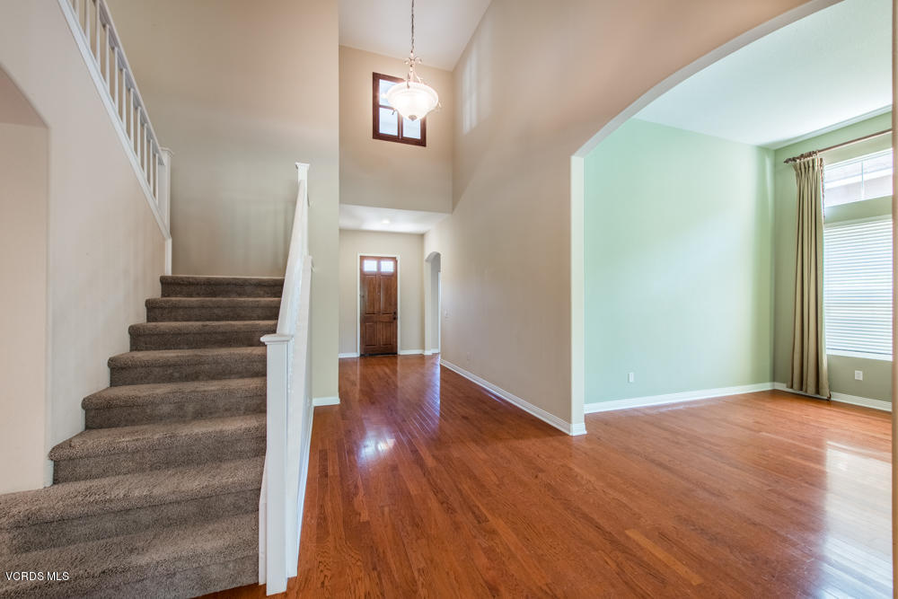 277 Knoll Ridge Road Simi Valley, CA 93065 - Photo 8 of 37 a view of an entryway with wooden floor and a window