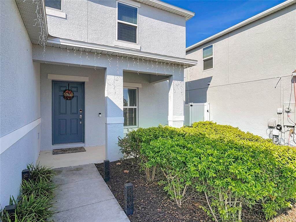 1146 Calico Pointe Circle Groveland, FL 34736 - Photo 3 of 54 a view of a house with a small yard